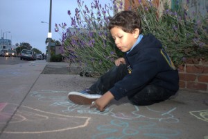 boy draw sidewalk